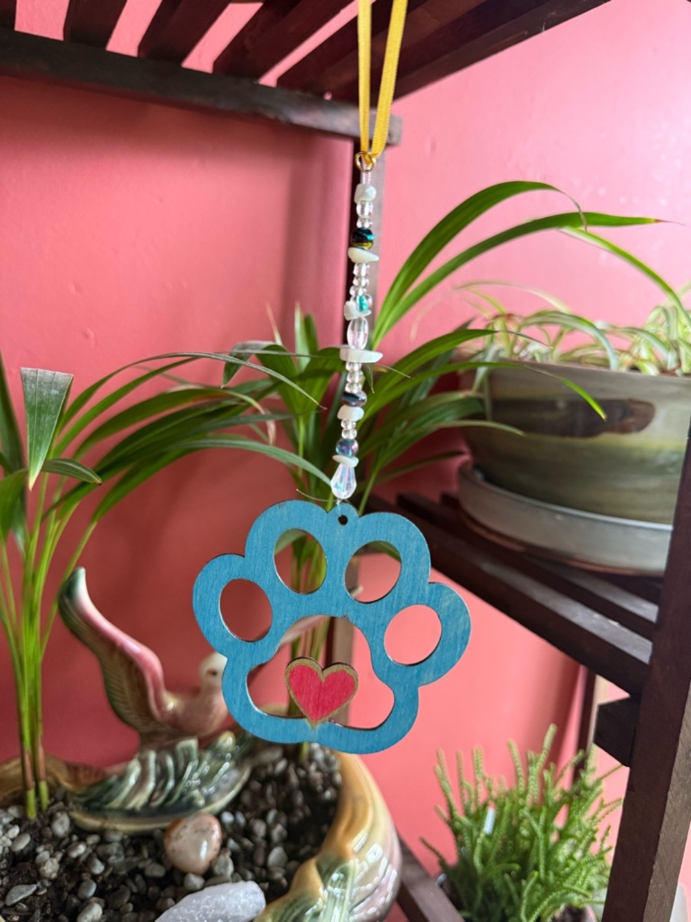 Hand crafted
Wood Blue/red Paw Print Hanging Pet Ornament with Heart Accent